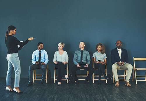 Female choosing a candidate for recruitment